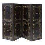 A Continental ebonised and painted four fold screen,