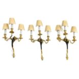 A set of three Louis XV design bronze and gilt-bronze wall lights,