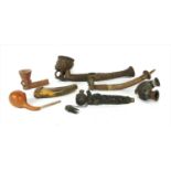 Six African pipes,