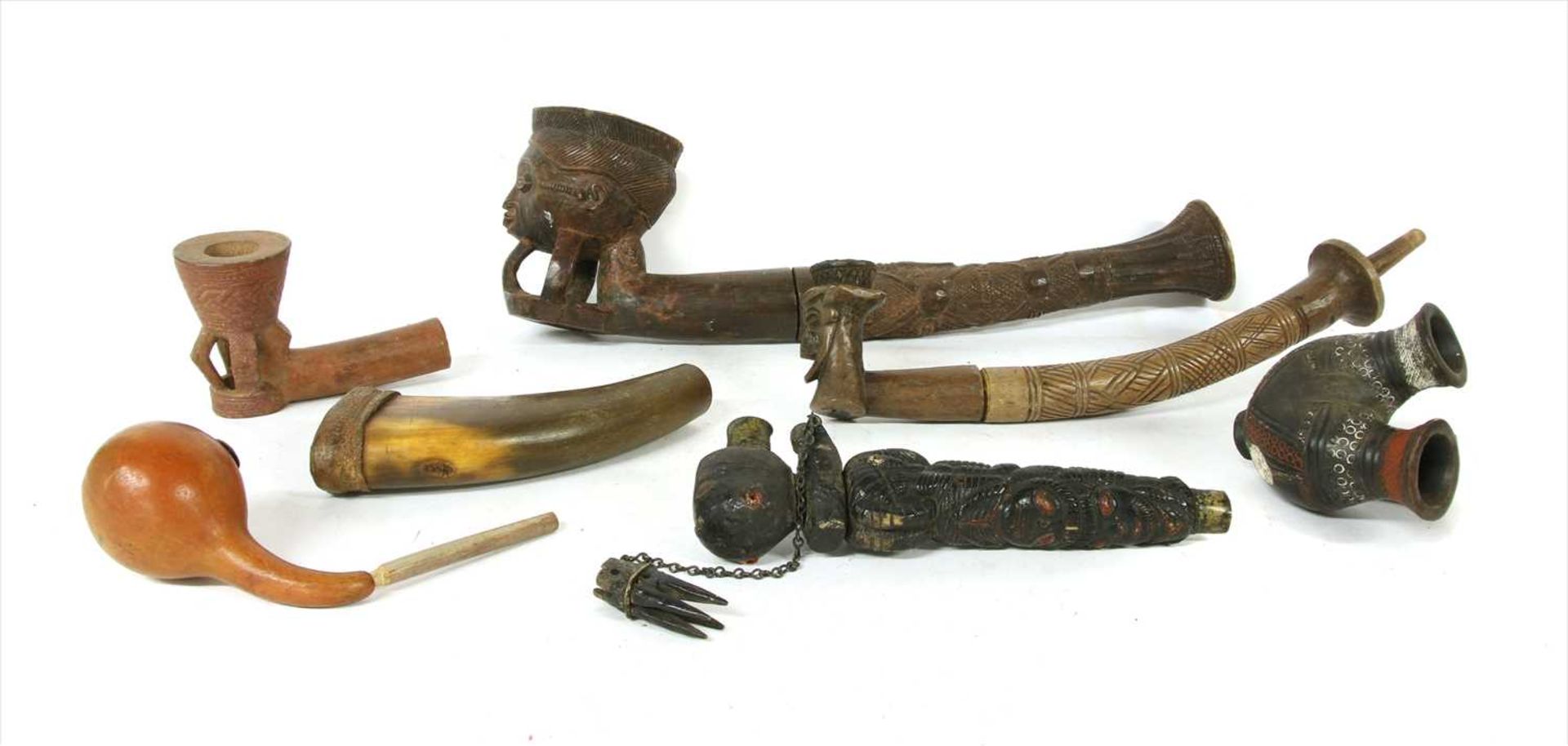 Six African pipes,