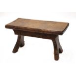 A heavy burr elm low table,