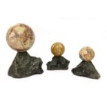 A trio of grand tour marble balls,