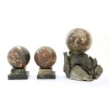 A trio of grand tour marble balls,