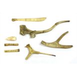 A collection of Scandinavian antler pipes and objects,
