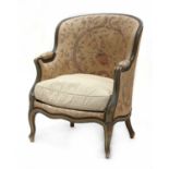 A French carved beechwood and painted armchair,