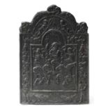 A 17th century-style cast iron fireback,