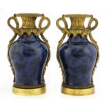 A pair of gilt-bronze mounted Chinese porcelain cassolettes,