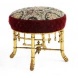 A Napoleon III period giltwood stool,