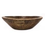 A large treen dairy bowl,