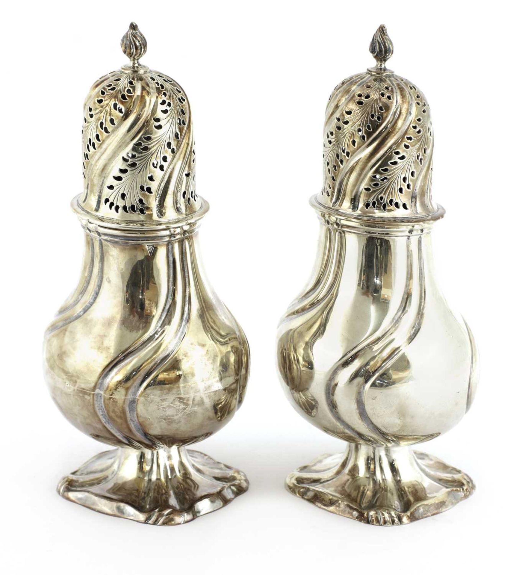 A pair of Dutch silver casters,