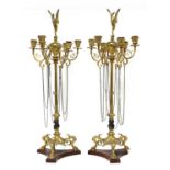A pair of bronze candelabra,