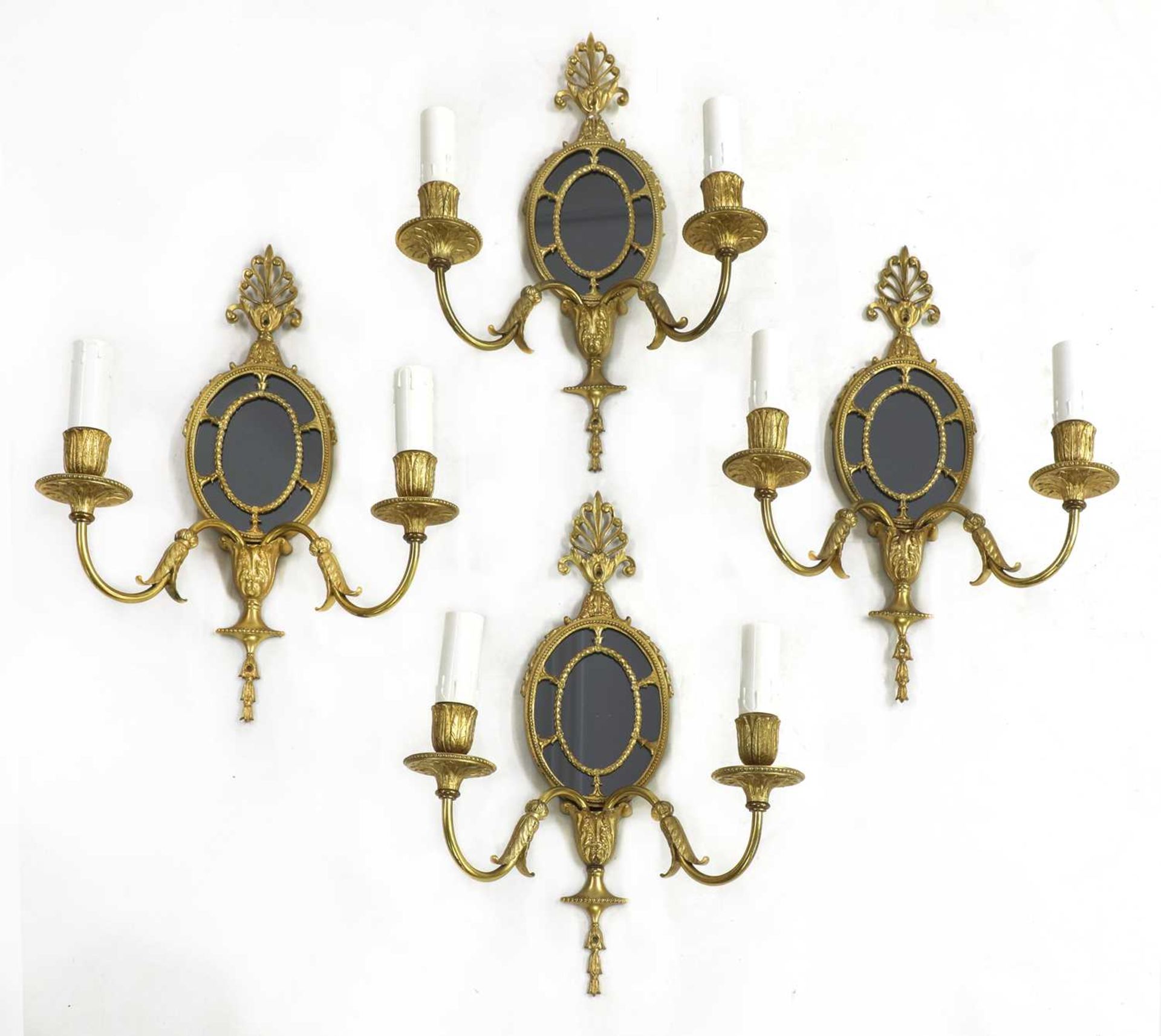 A set of four George II design gilt metal girandoles,