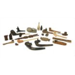 A collection of Central and South American pipes and bowls,