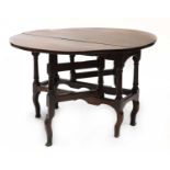 An oak gateleg table,