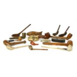 Six treen pipe cases,