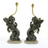 A pair of bronze table lamps,