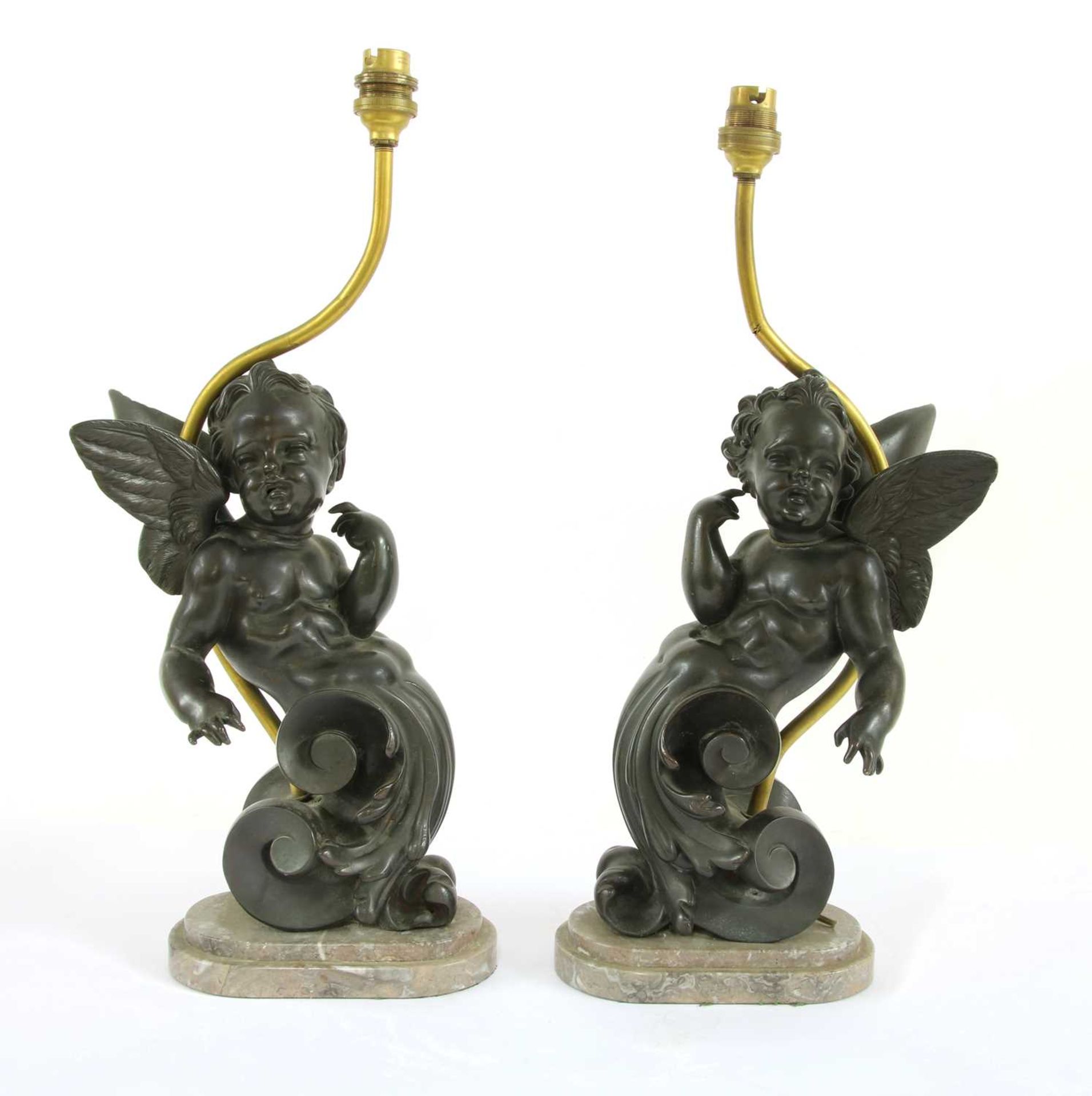 A pair of bronze table lamps,