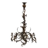 A pair of French rococo-style gilt bronze eight-light chandeliers,
