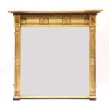A large George IV gilt overmantel mirror,