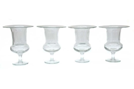 A set of four glass celery vases,