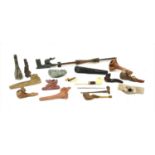 A collection of stone, terracotta and horn pipes,