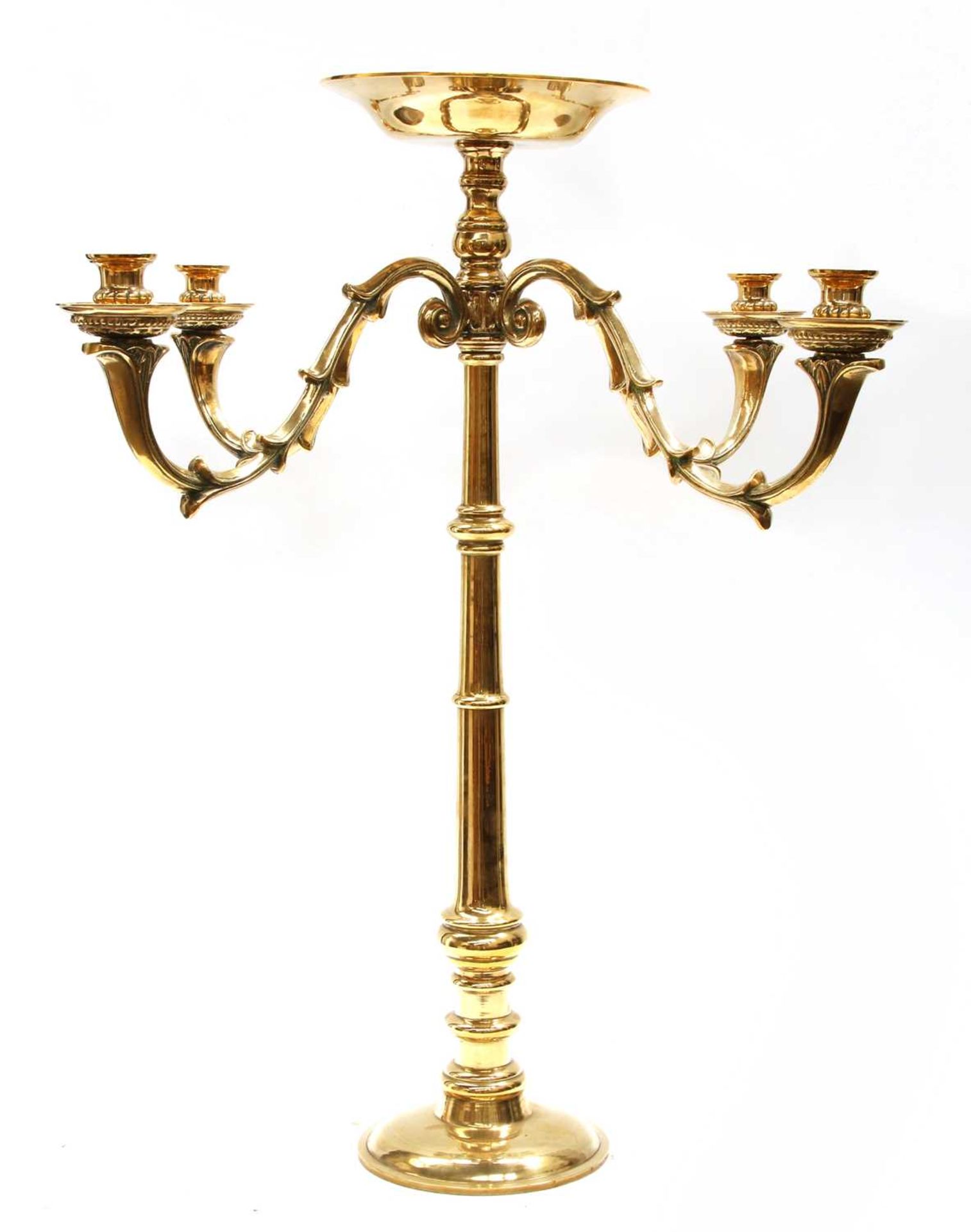 A brass four-branch candelabrum,