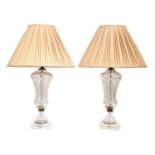 A pair of cut-glass table lamps,