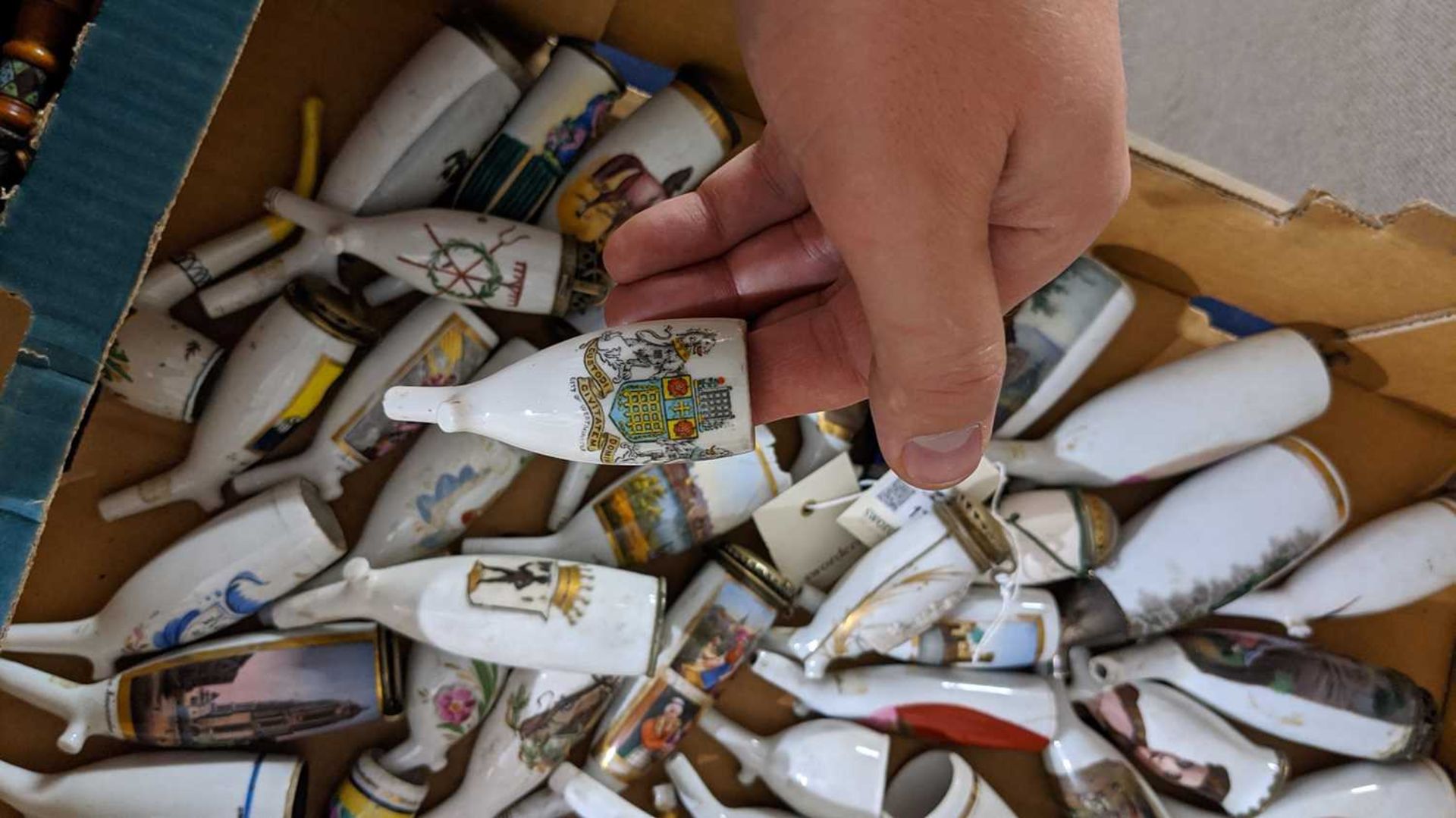 A collection of German porcelain pipe bowls, - Image 11 of 12