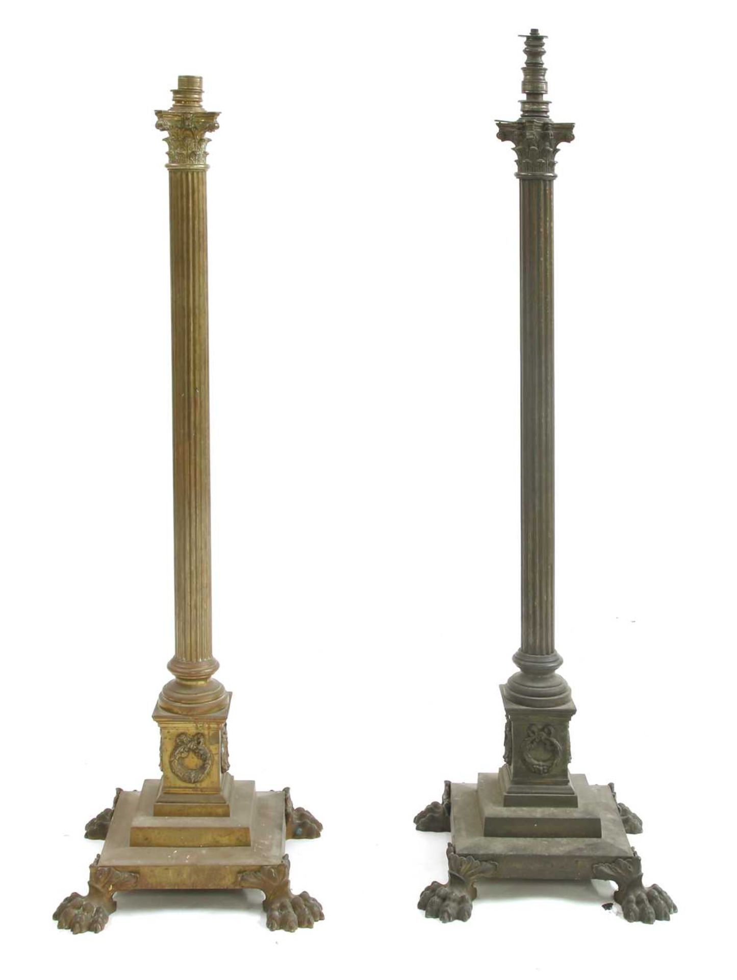 A near pair of brass Corinthian column standard lamps,