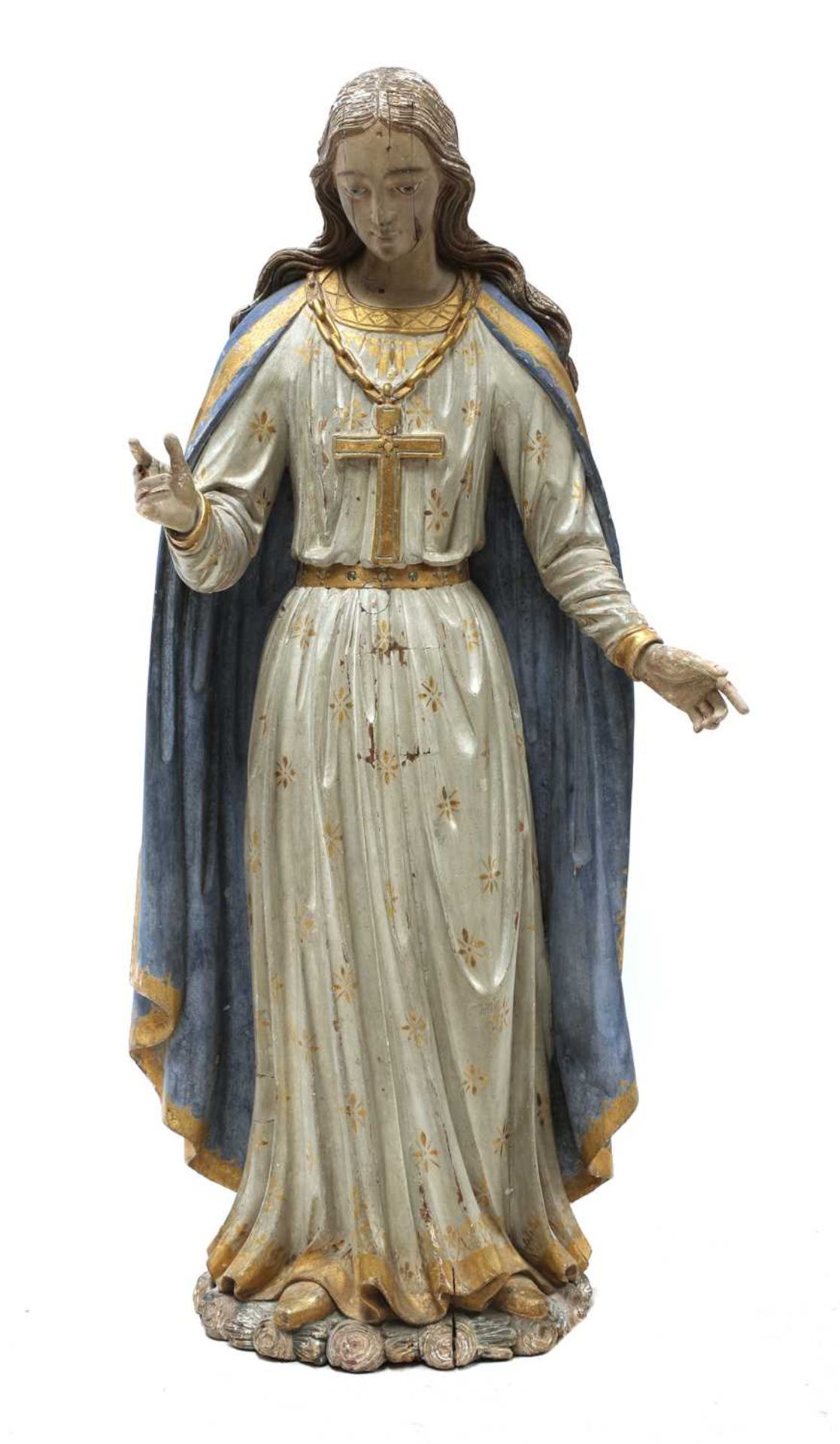 A carved and polychrome painted figure of the Virgin Mary,