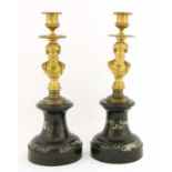 A pair of French Empire-style gilt-bronze figural candlesticks,