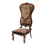 A Victorian rosewood high-backed chair,