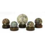 Five grand tour marble balls,