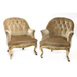 A pair of Victorian giltwood salon tub chairs,