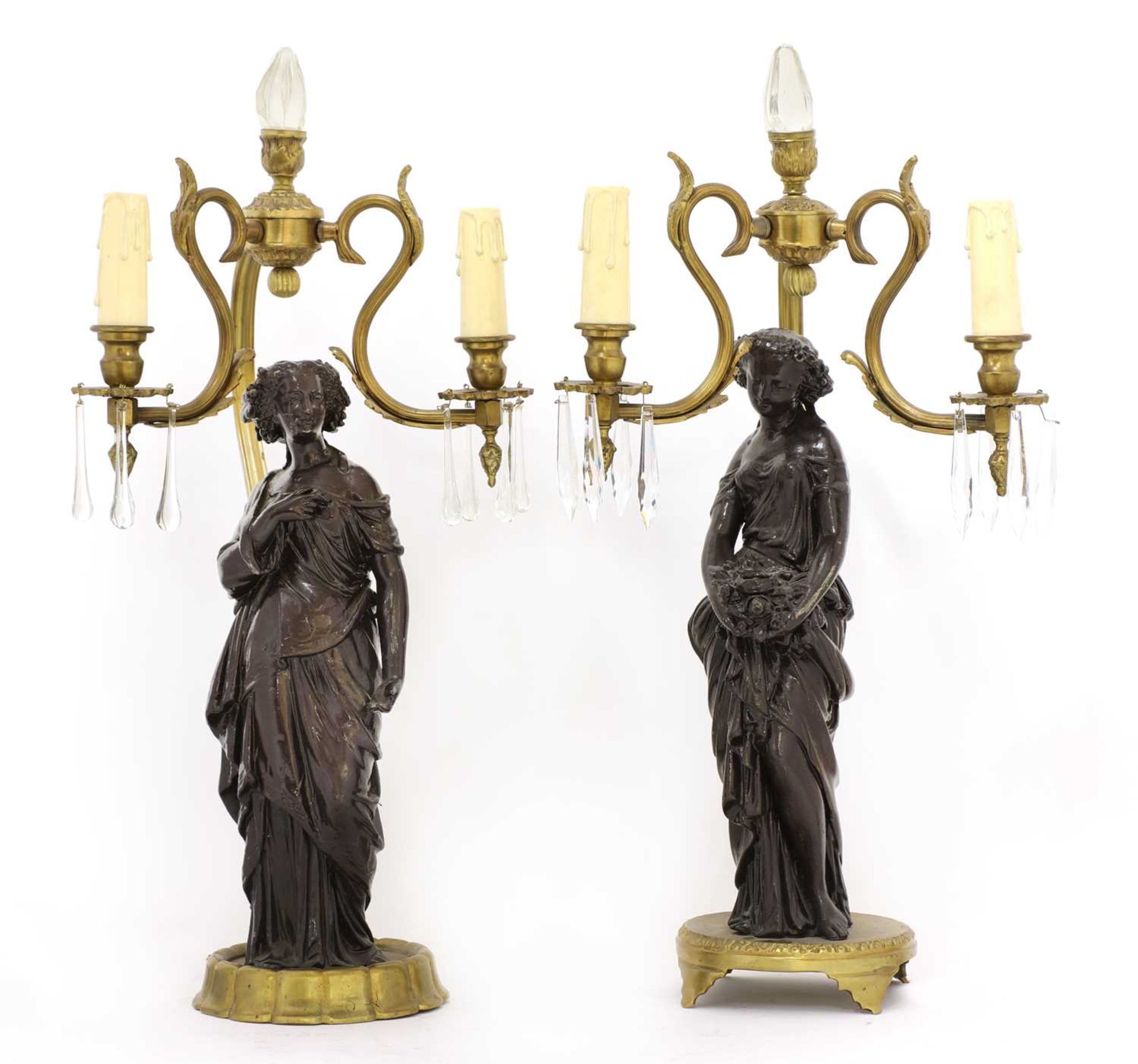 A near pair of gilt-bronze and spelter figural table lamps,