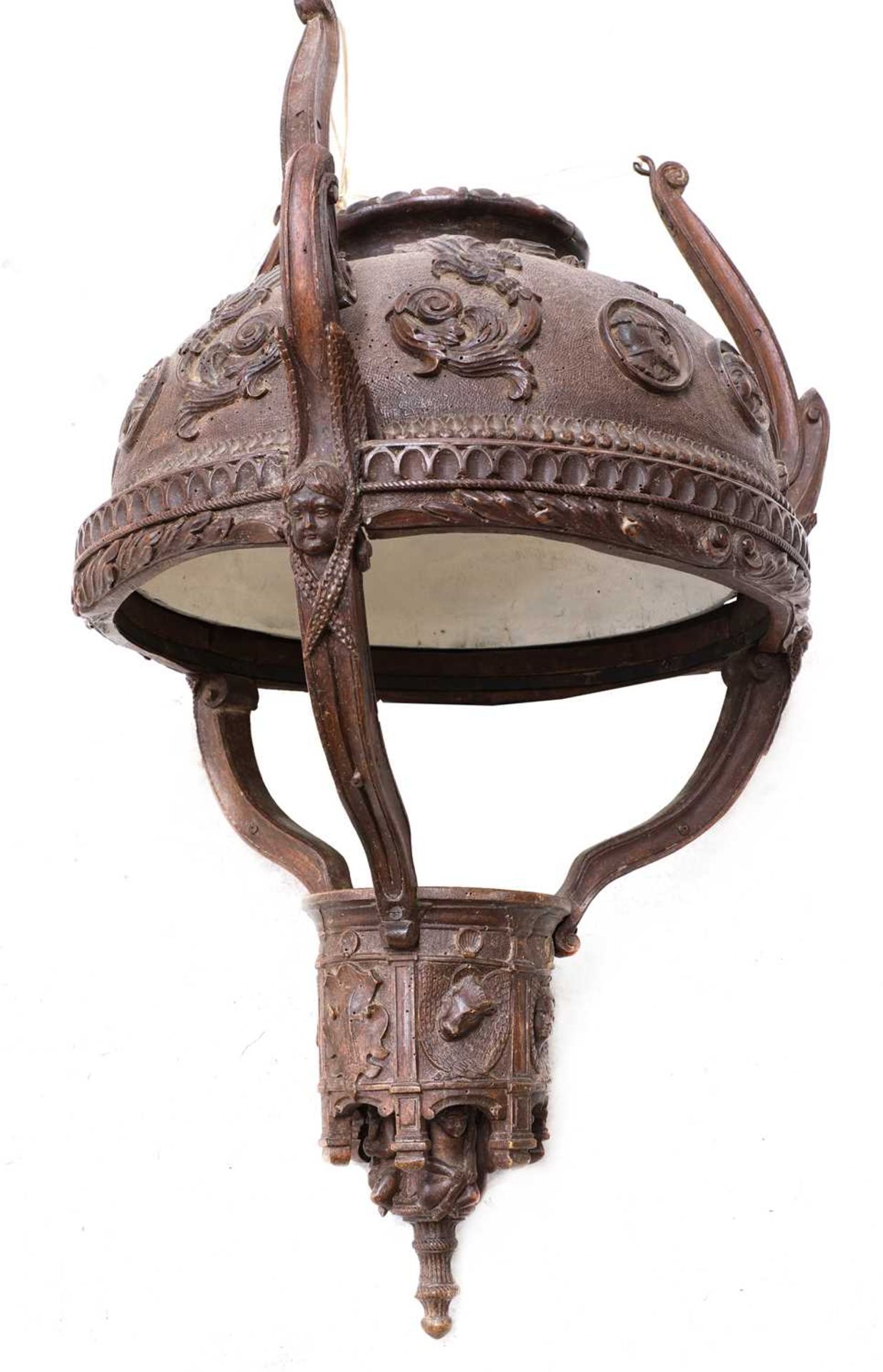 A carved wooden hanging lantern,