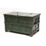 A green painted iron bound chest,