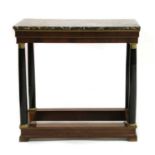 An Empire marble-topped mahogany and ebonised console table,