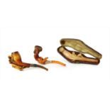 Three erotic meerschaum pipes,