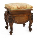 A French walnut adjustable piano stool,