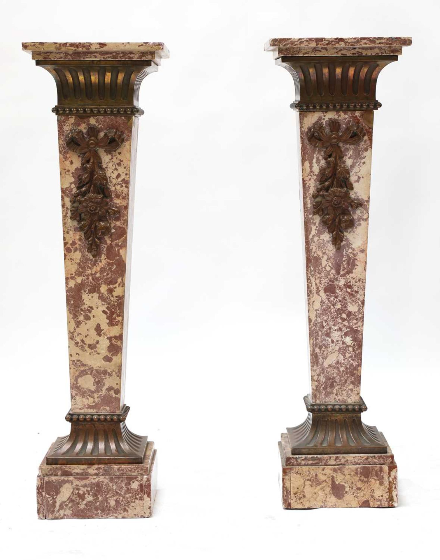 A pair of Louis XVI-style pink marble pedestals,