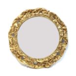 A circular gilt framed mirror,