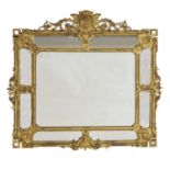 A large rectangular gilt-framed wall mirror,