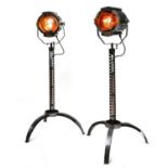 A pair of steel, copper and brass 'Strand' electric stage lights,