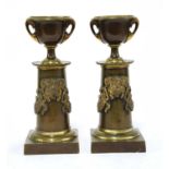 A pair of Regency bronze and gilt-bronze cassolettes,