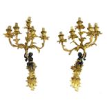 A pair of Louis XV-style ormolu and bronze wall lights,