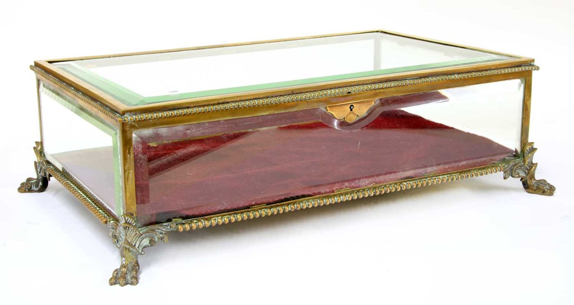A gilt brass tabletop vitrine,