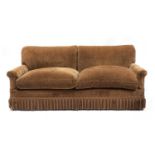 A three-seater sofa by Howard & Sons,