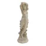 A carved marble statue of a dancing maiden,