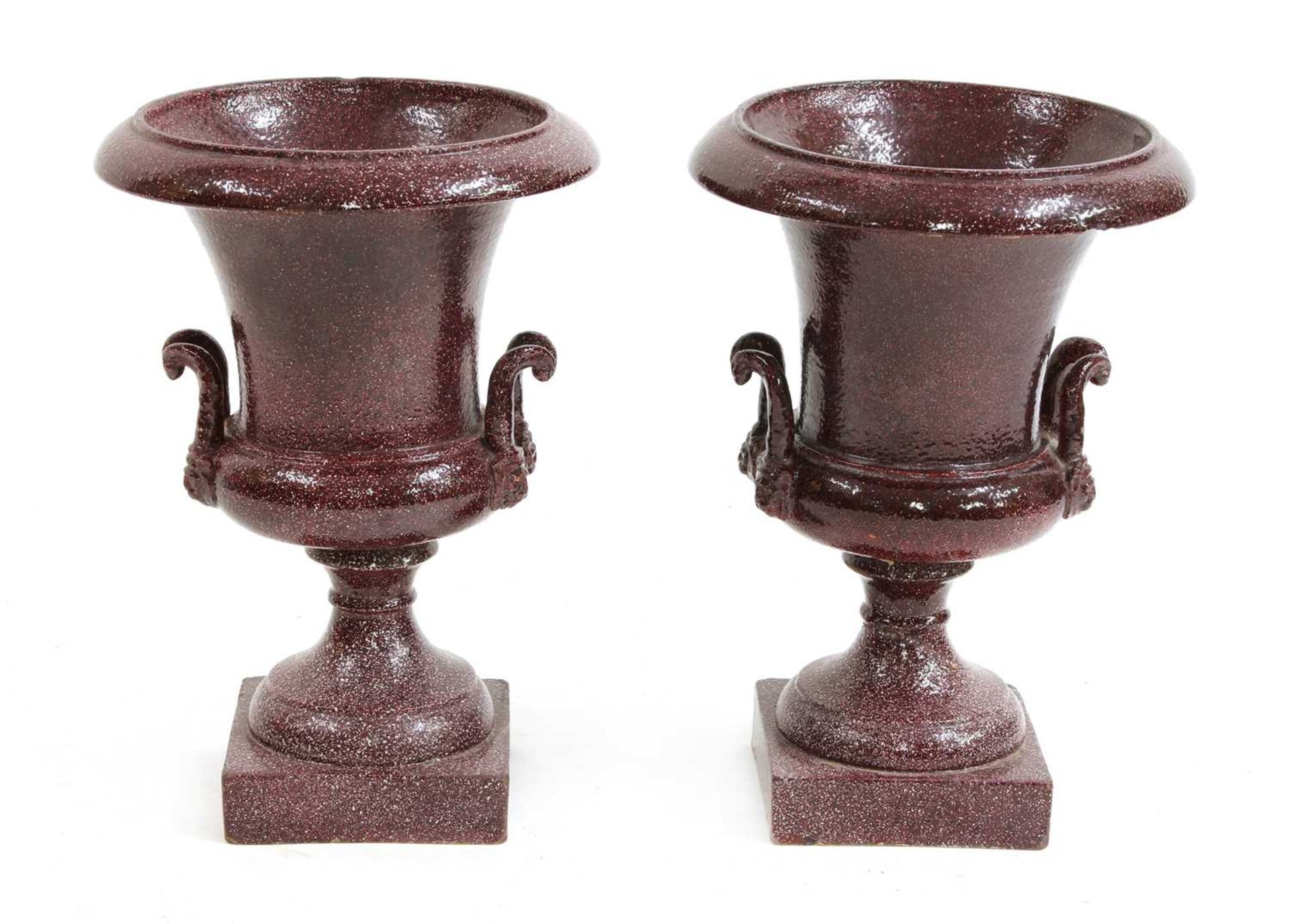 A pair of faux porphyry terracotta urns,